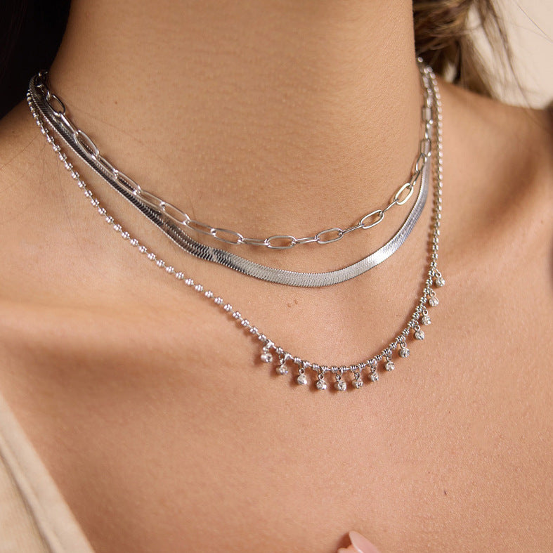 Zilveren schakelarmband of ketting