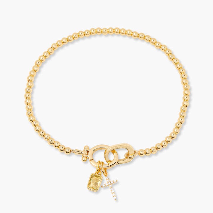 Kralenarmband met geboortesteen en kruisje