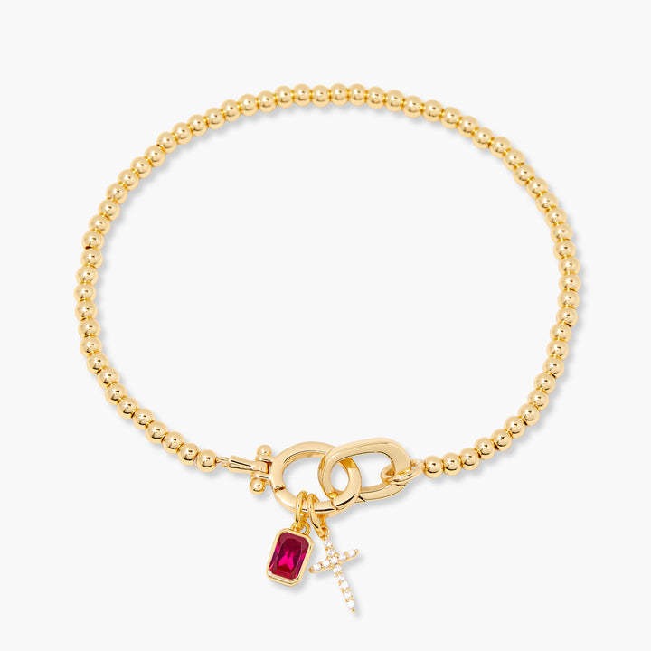 Kralenarmband met geboortesteen en kruisje
