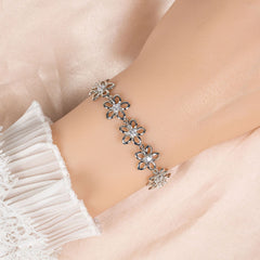Armband met bloem klavertje