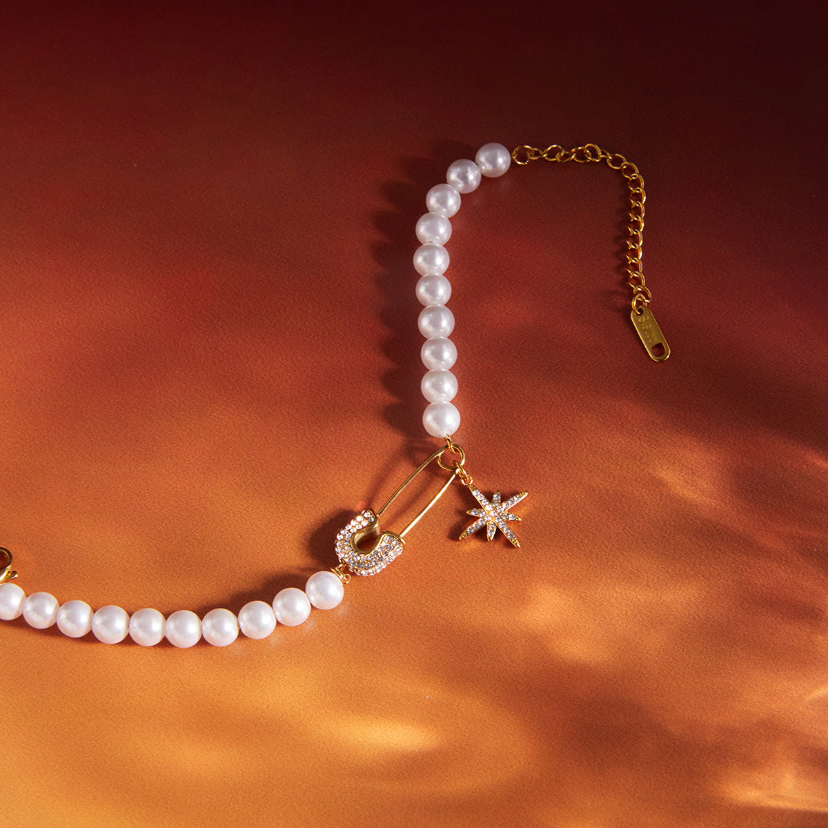 Armband met parel en sterretje