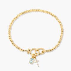 Kralenarmband met geboortesteen en kruisje